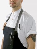 White chef’s shirt detail with apron