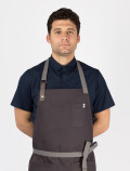 Camicia da lavoro blu da chef con grembiule
