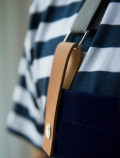 Chef’s blue apron leather detail