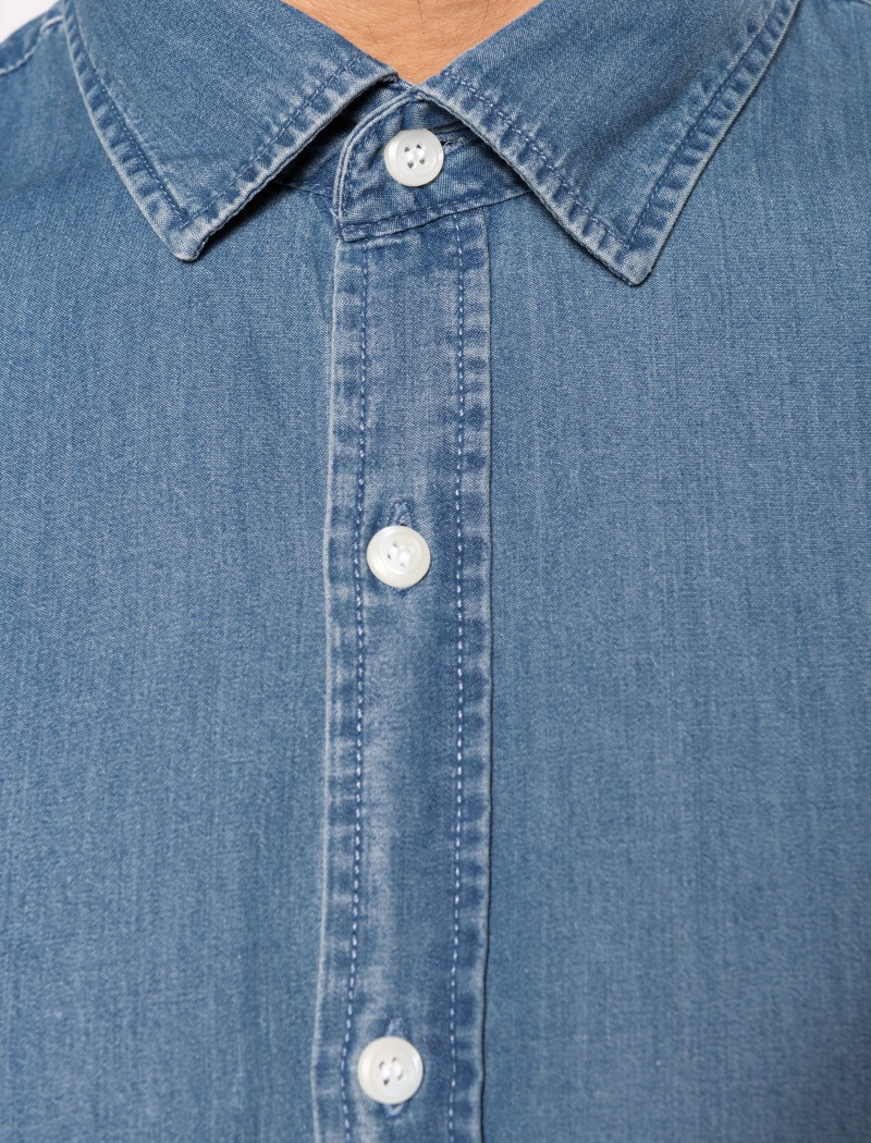 Men’s light denim shirt neck detail Men’s light denim shirt neck detail