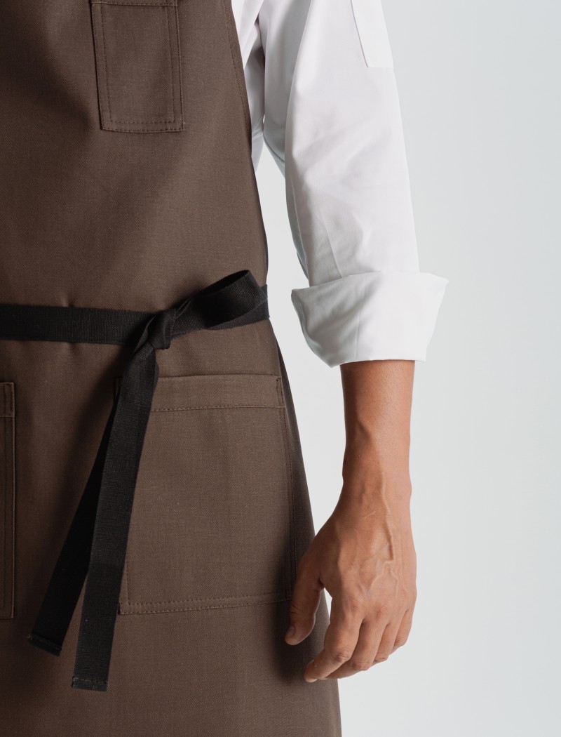 Detalhe do avental castanho Detalhe do avental castanho