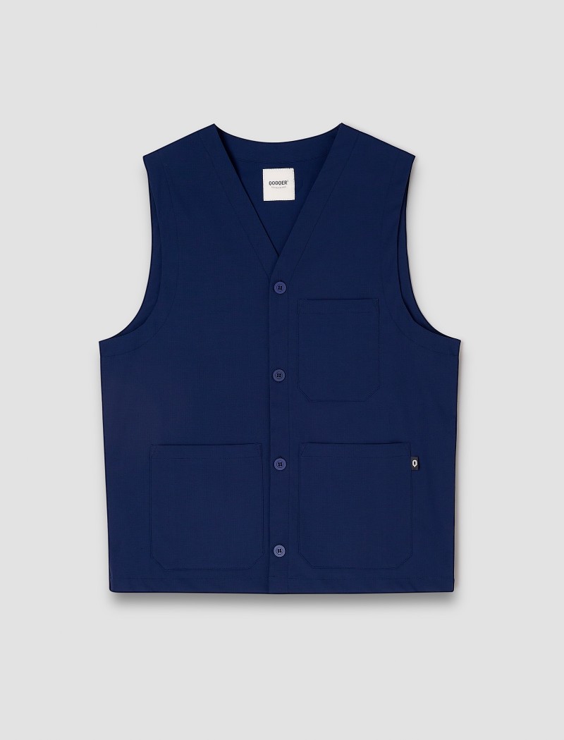 Colete azul de empregado de mesa Colete azul de empregado de mesa